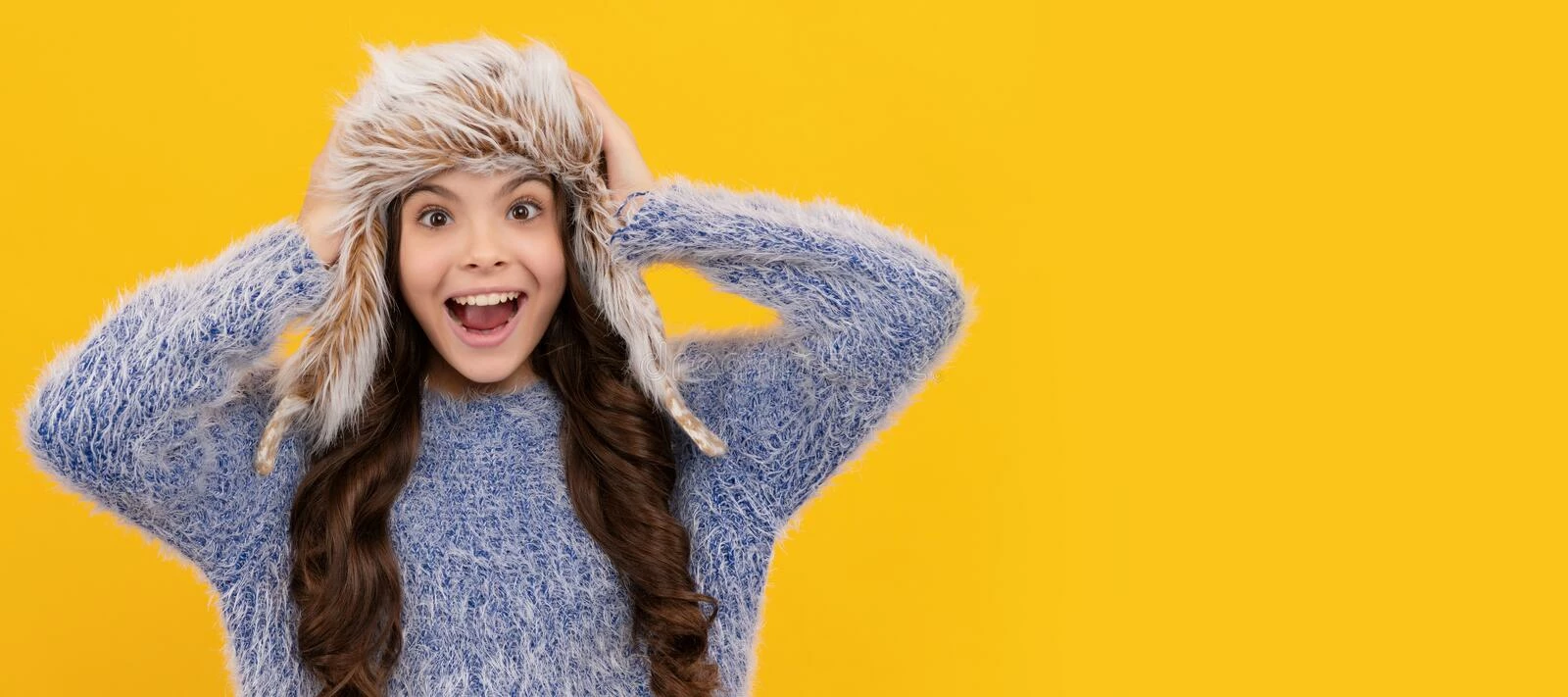 clothing popular shop 3 clothing popular shop -clothing popular shop female fashion model teen girl knitwear yellow background banner child winter hat studio poster header copy space 259208511